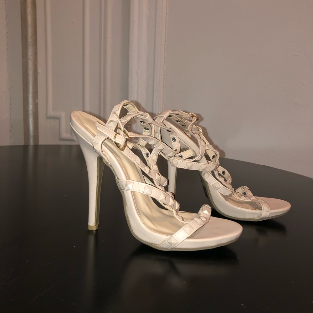 Strapped tanned and studded heels. Size 7